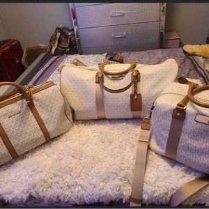 Michael Kors travel bags